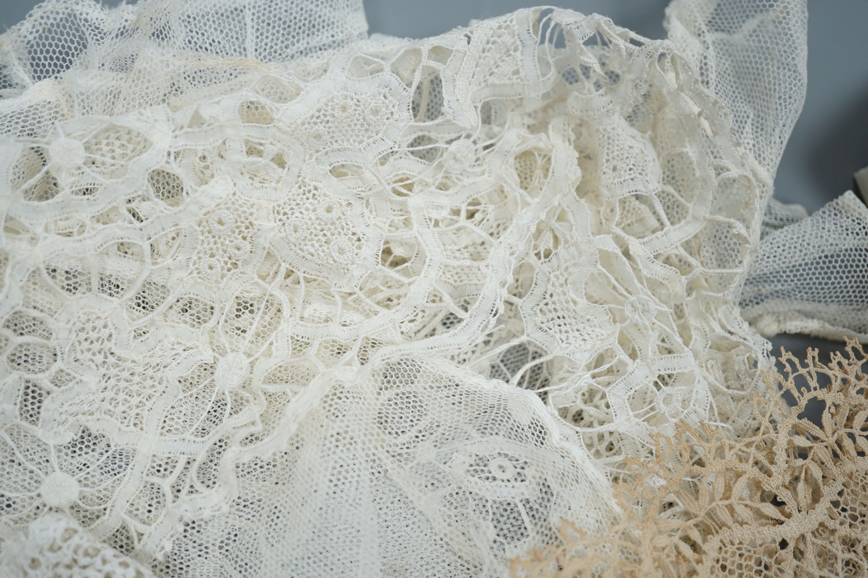 A collection of 19th century hand made bobbin lace and other handmade collars and trimmings, including Honiton, Irish crochet.